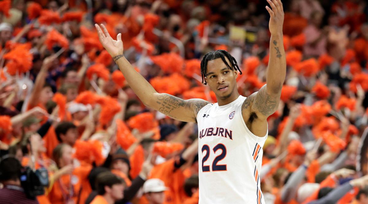 Auburn guard Allen Flanigan (22) reacts after a score during the second half of an NCAA college basketball game against Kentucky Saturday, Jan. 22, 2022, in Auburn, Ala.