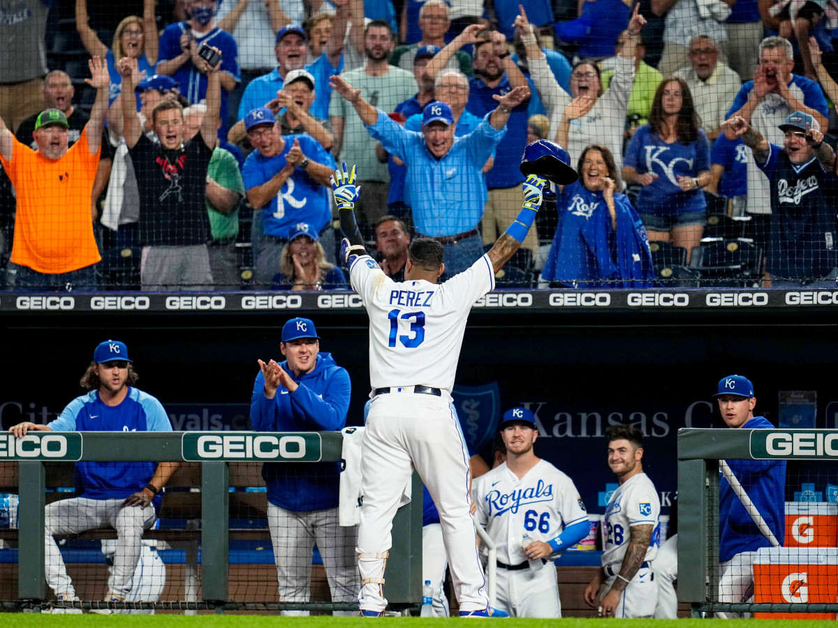 Sep 29, 2021; Kansas City, Missouri, USA; Kansas City Royals catcher Salvador Perez (13) celebrates after tying the franchise single season home run record during the first inning against the Cleveland Indians at Kauffman Stadium.