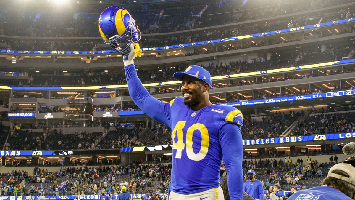 Von Miller smiles and gestures to the crowd after a Rams game