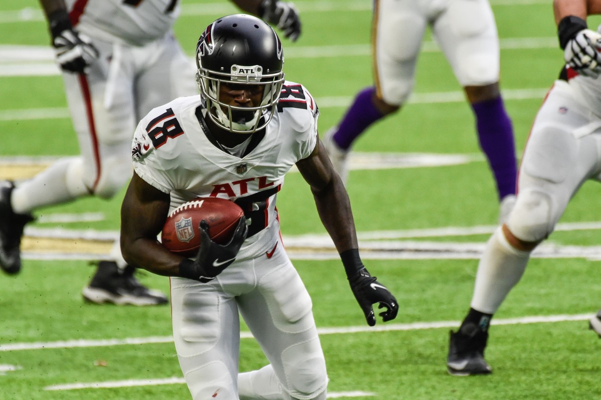 Atlanta Falcons WR Calvin Ridley runs after making catch