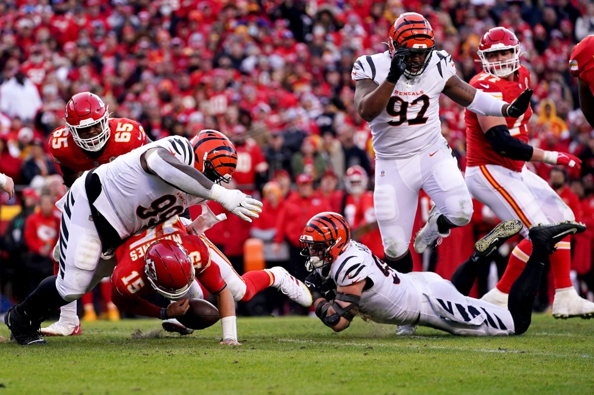 Cincinnati Bengals defensive end Sam Hubbard (94) sacks Kansas City Chiefs quarterback Patrick Mahomes (15) in the fourth quarter during the AFC championship NFL football game, Sunday, Jan. 30, 2022, at GEHA Field at Arrowhead Stadium in Kansas City, Mo. The Cincinnati Bengals defeated the Kansas City Chiefs, 27-24, to advance to the Super Bowl. Cincinnati Bengals At Kansas City Chiefs Jan 30 Afc Championship 356