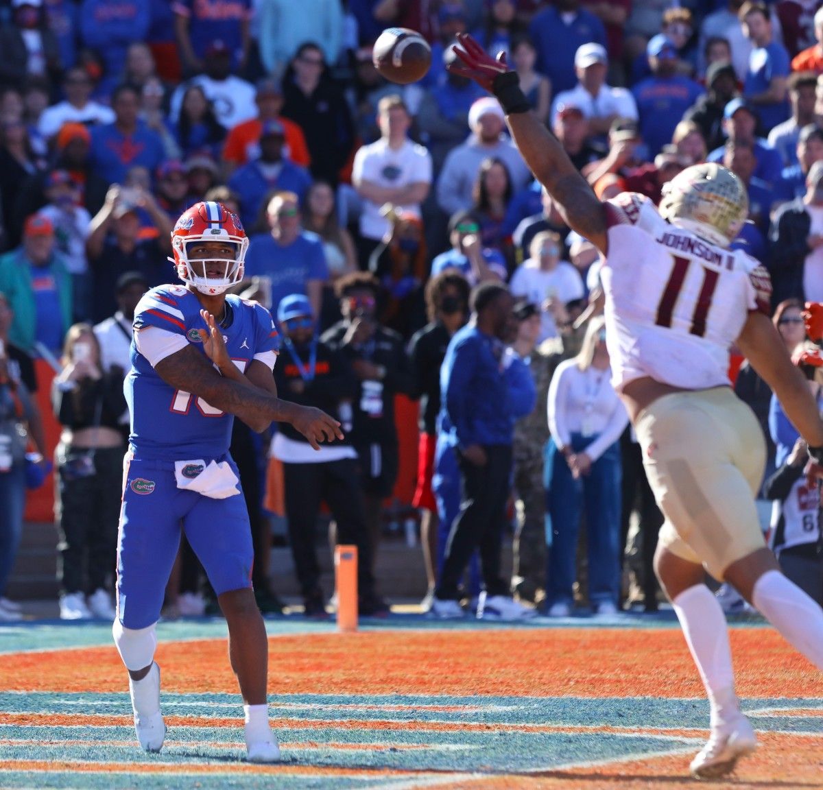Florida State's Jermaine Johnson puts the heat on Florida QB Anthony Richardson during the season