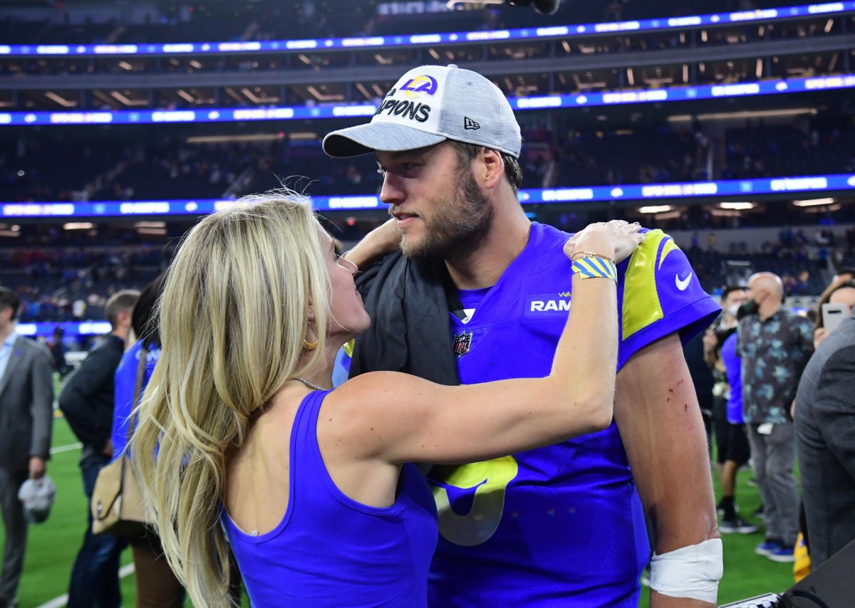 Los Angeles Rams quarterback Matthew Stafford (9) with wife Kelly Hall after defeating the San Francisco 49ers in the NFC Championship Game at SoFi Stadium.