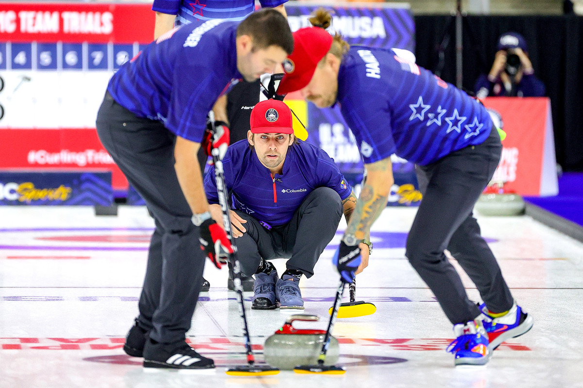 Plys (center) was momentarily bounced from the world championships last year for what ended up a false positive COVID-19 test.