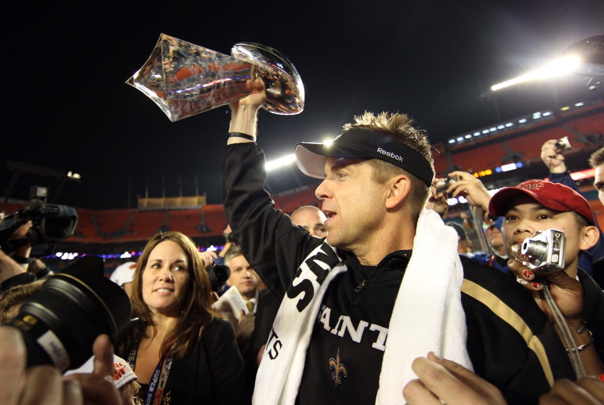 New Orleans Saints head coach Sean Payton hoists the Lombardi Trophy after Super Bowl XLIV against the Indianapolis Colts at Sun Life Stadium.