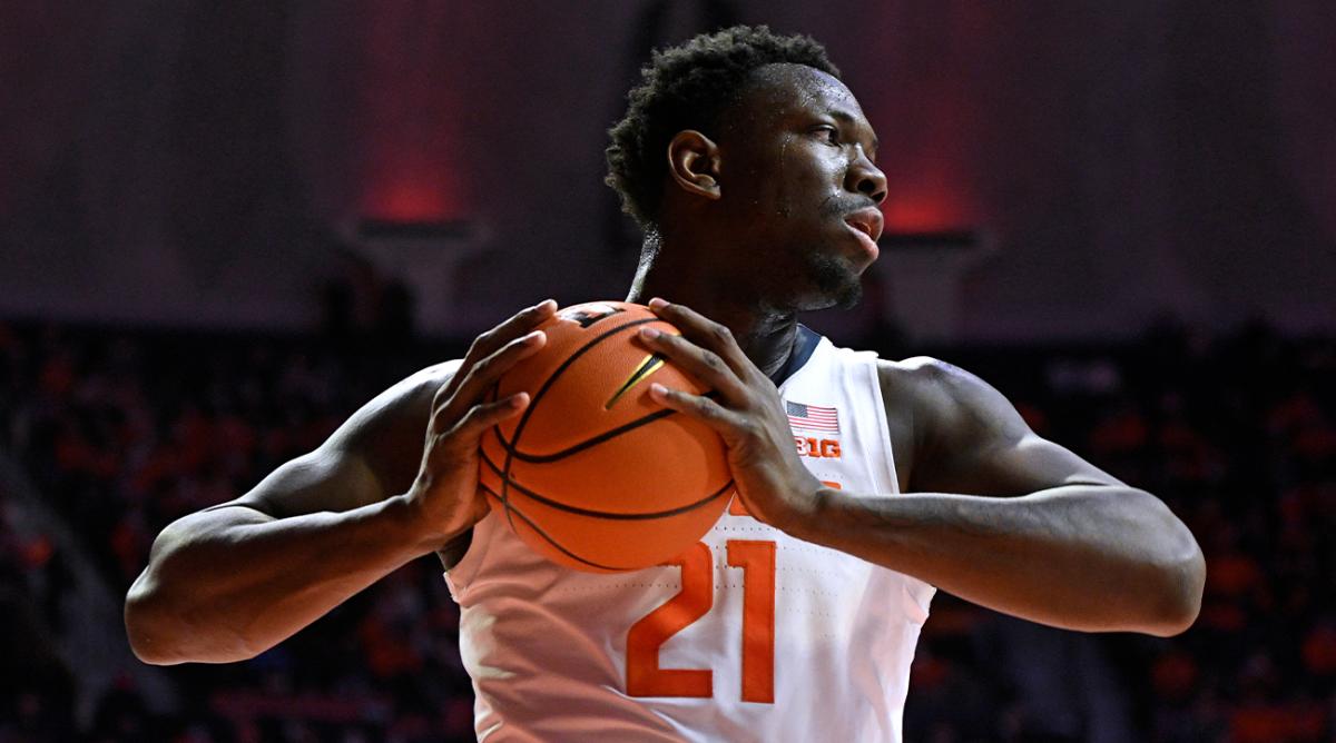 Illinois' Kofi Cockburn holds the ball after gathering in a rebound during the first half of the team's NCAA college basketball game against Maryland on Thursday, Jan. 6, 2022, in Champaign, Ill.
