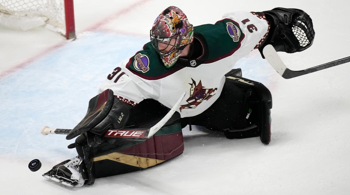 Arizona Coyotes goaltender Scott Wedgewood makes a skate save against the Colorado Avalanche during the third period of an NHL hockey game Tuesday, Feb. 1, 2022, in Denver.