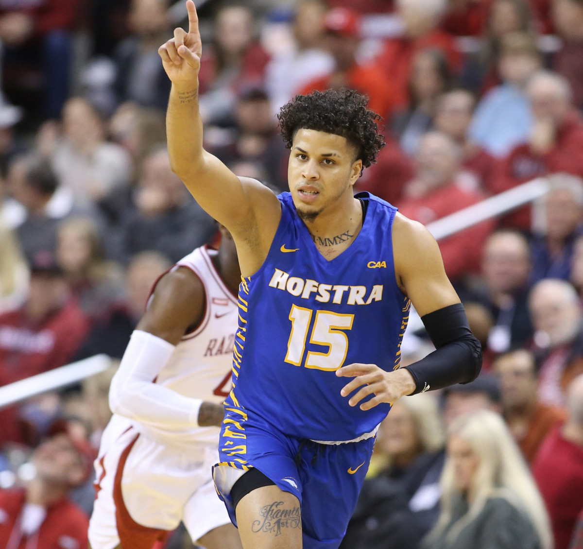 Hofstra Pride guard Omar Silverio (15) reacts after making a three point shot in the first half against the Arkansas Razorbacks at Simmons Bank Arena.