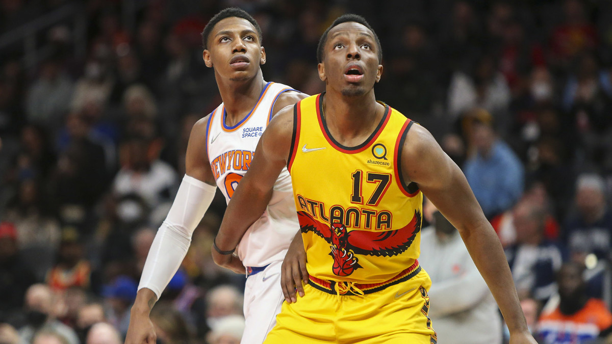 Atlanta Hawks forward Onyeka Okongwu (17) boxes out New York Knicks guard RJ Barrett.