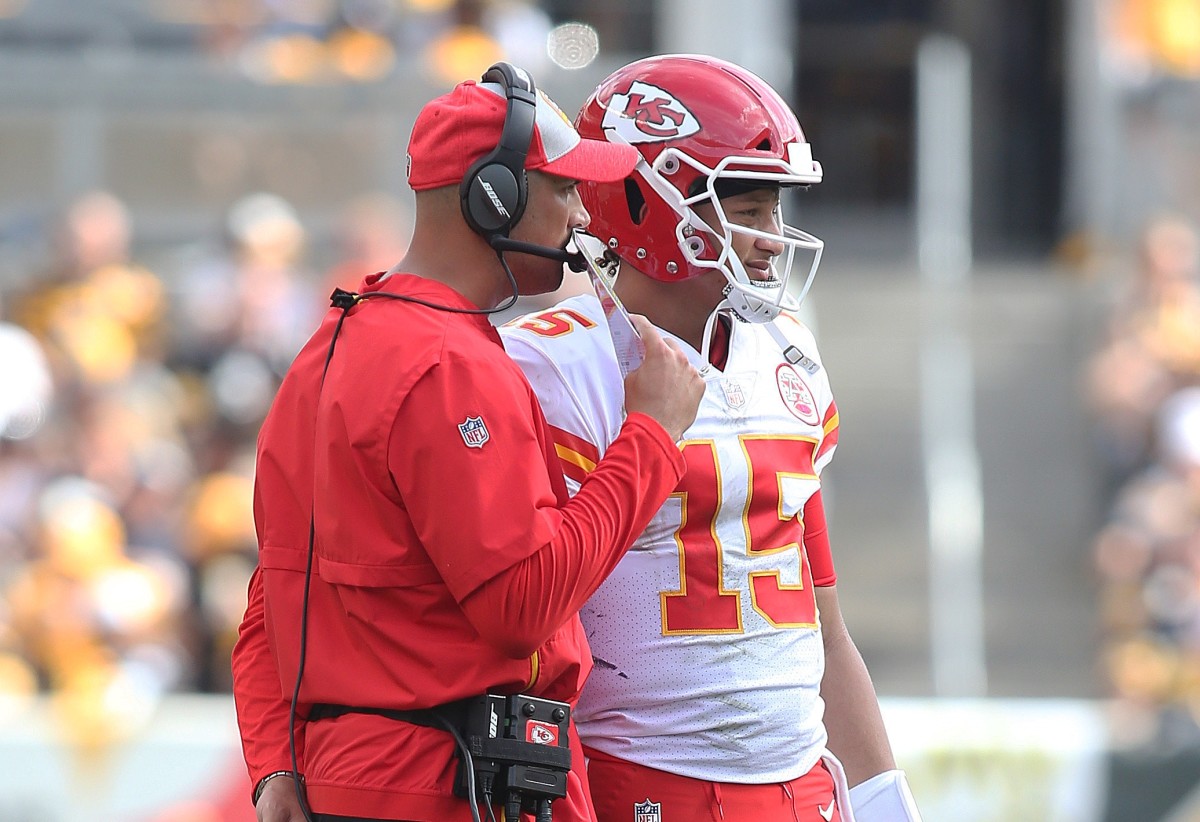 Sep 16, 2018; Pittsburgh, PA, USA; Kansas City Chiefs quarterbacks coach Mike Kafka (L) talks with quarterback Patrick Mahomes (15) against the Pittsburgh Steelers during the third quarter at Heinz Field. The Chiefs won 42-37. Mandatory Credit: Charles LeClaire-USA TODAY Sports