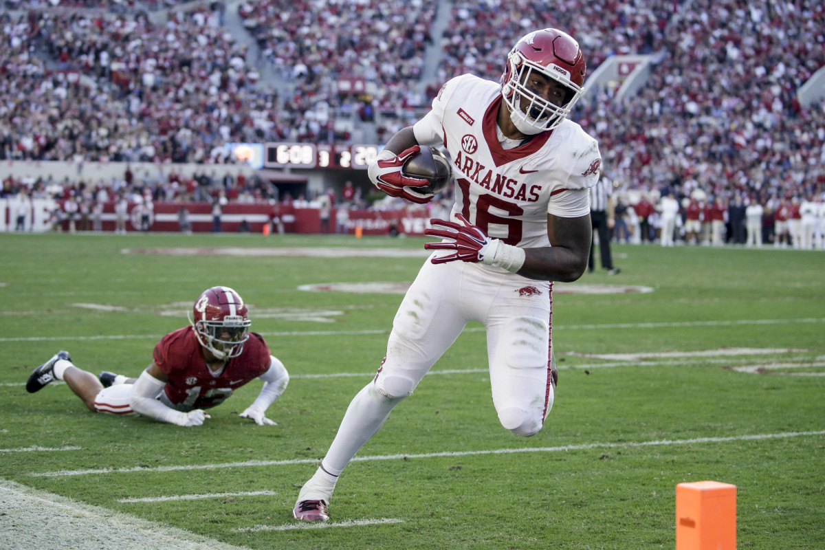 Nov 20, 2021; Tuscaloosa, Alabama, USA; Arkansas Razorbacks wide receiver Treylon Burks (16) catches a pass for a touchdown against the Alabama Crimson Tide during the first half at Bryant-Denny Stadium. Mandatory Credit: Butch Dill-USA TODAY Sports