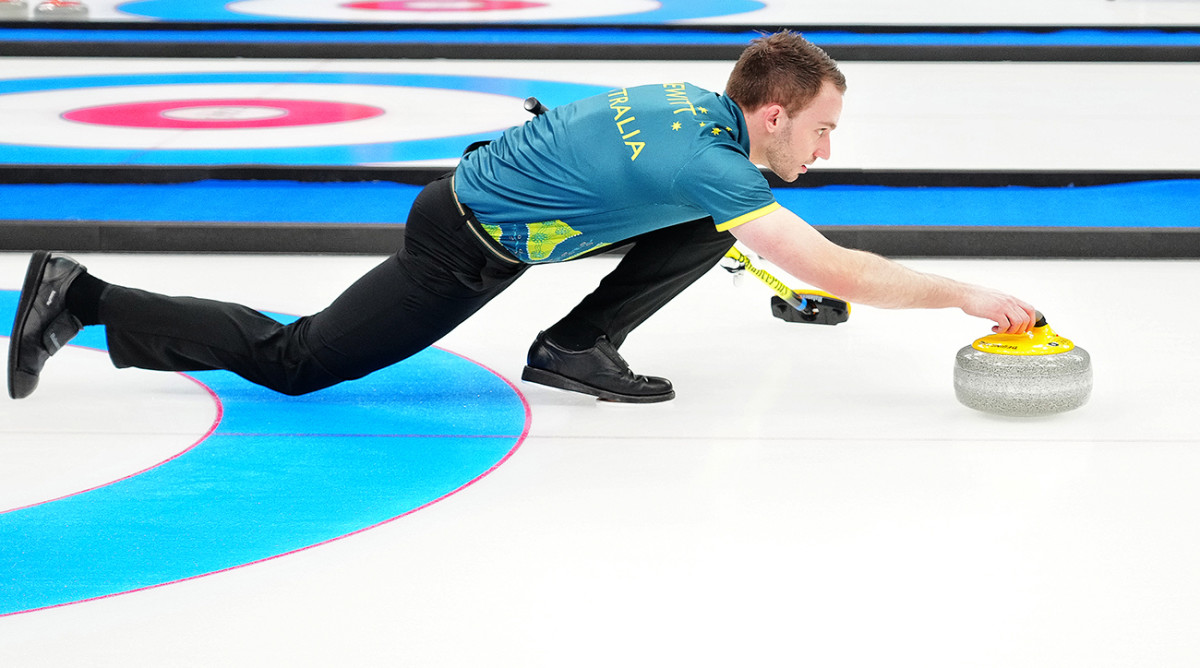 Australian curler Dean Hewitt competes during the Beijing Olympics.