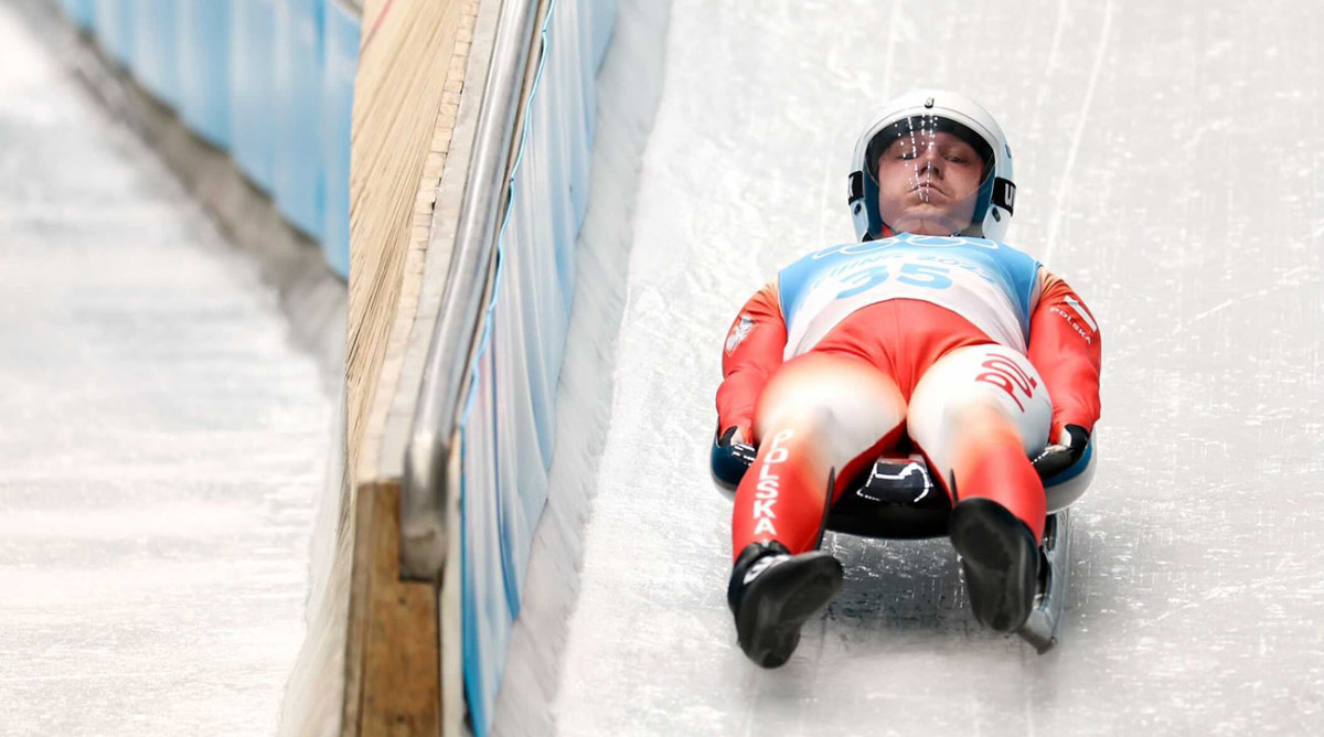 Mateusz Sochowicz of Poland competes in men’s luge at the Beijing Olympics.