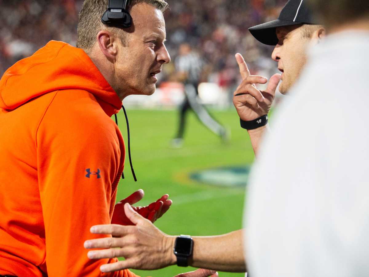 Auburn Tigers head coach Bryan Harsin talks with an official during the Iron Bowl at Jordan-Hare Stadium in Auburn, Ala., on Saturday, Nov. 27, 2021. Alabama Crimson Tide defeated Auburn Tigers 24-22 in 4OT.