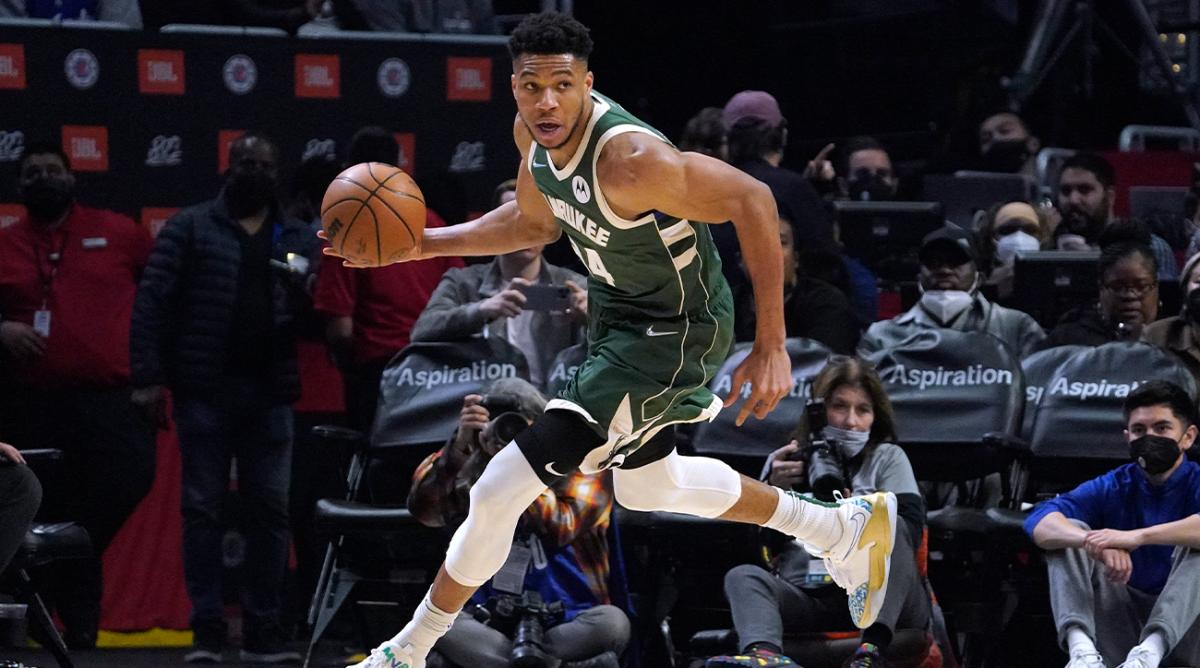 Milwaukee Bucks forward Giannis Antetokounmpo dribbles during the second half of an NBA basketball game against the Los Angeles Clippers Sunday, Feb. 6, 2022, in Los Angeles.