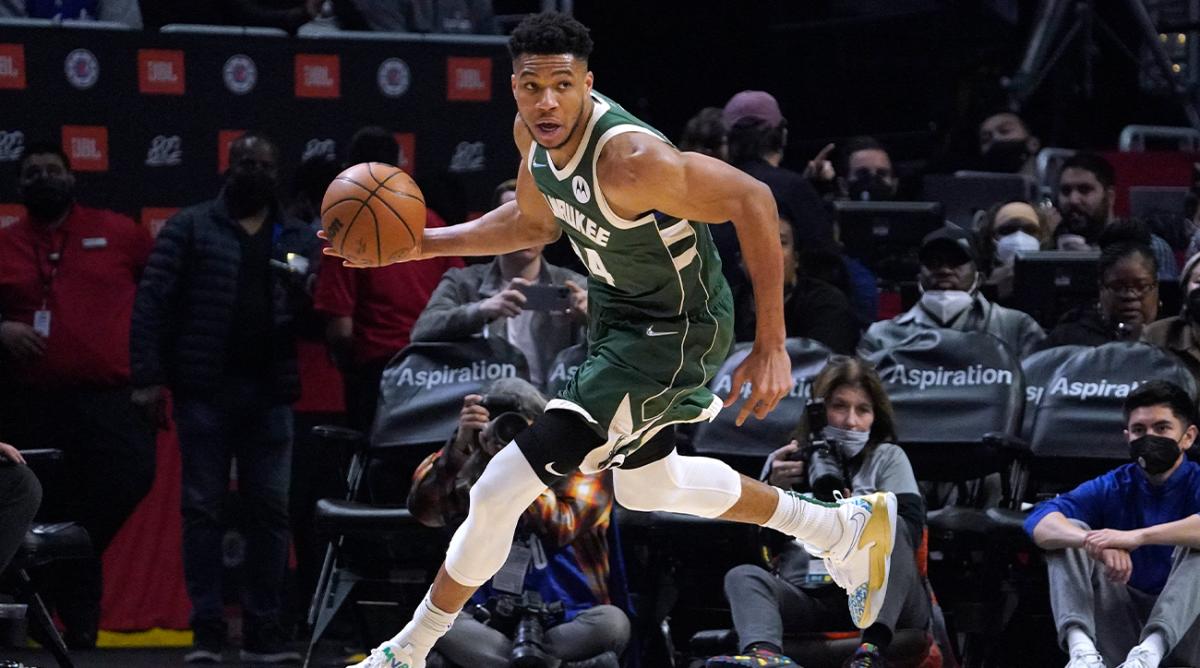 Milwaukee Bucks forward Giannis Antetokounmpo dribbles during the second half of an NBA basketball game against the Los Angeles Clippers Sunday, Feb. 6, 2022, in Los Angeles.
