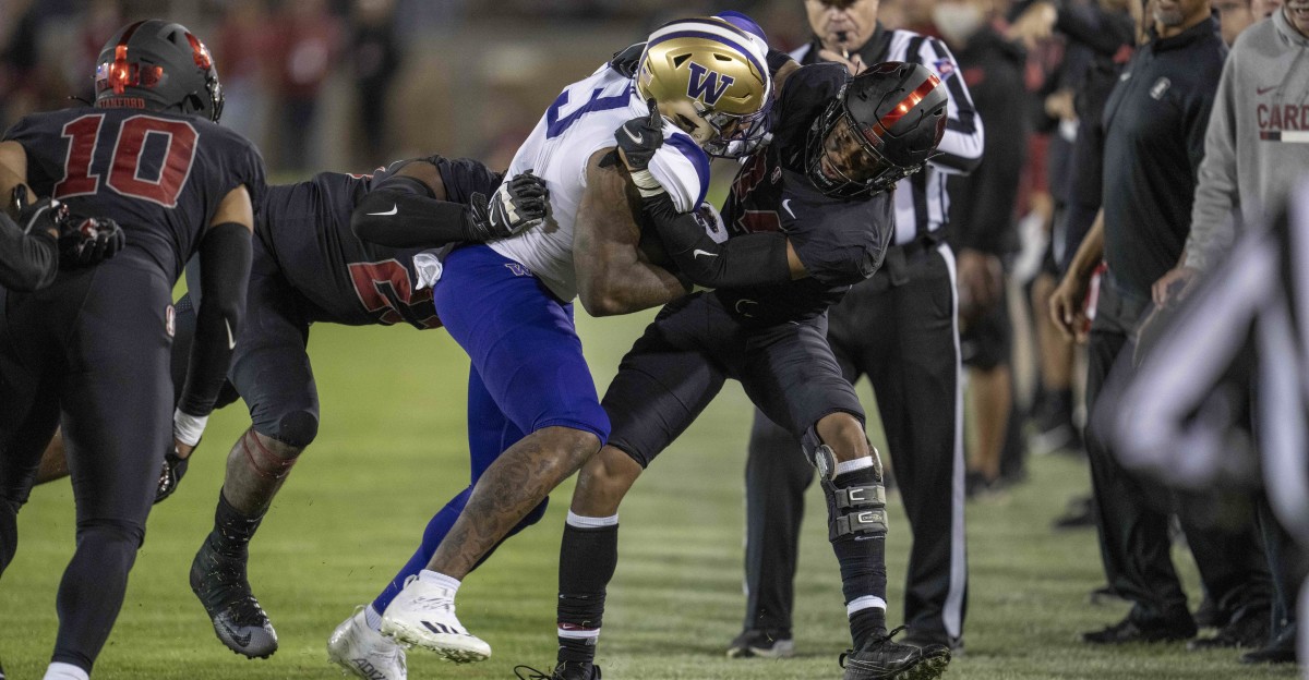 Jeremiah Martin has a sideline collision at Stanford.