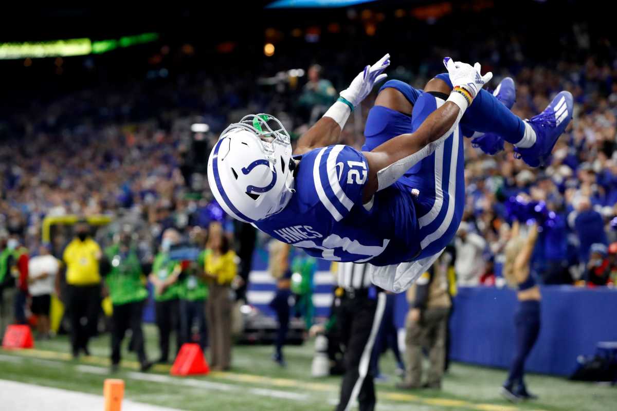Indianapolis Colts running back Nyheim Hines (21) does a flip after scoring a touchdown Thursday, Nov. 4, 2021, during a game against the New York Jets at Lucas Oil Stadium in Indianapolis.