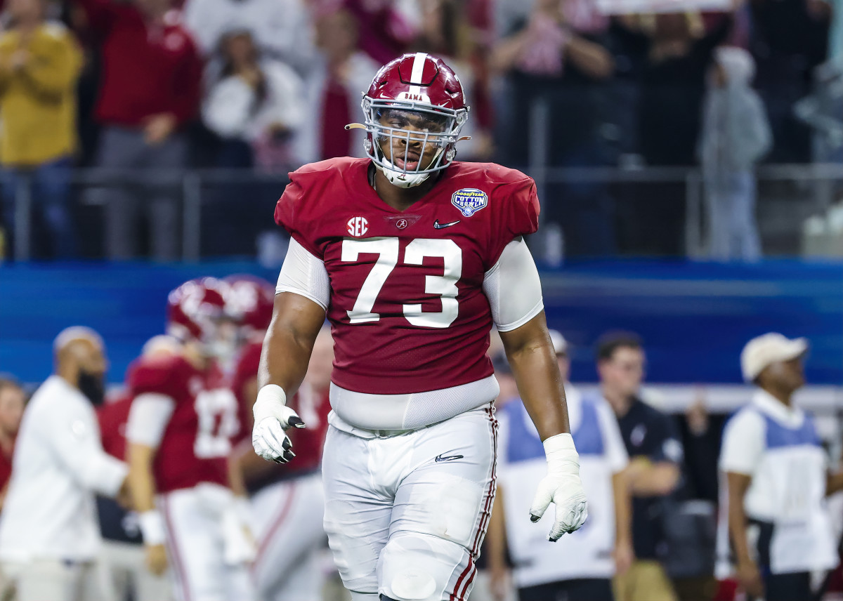 Alabama Crimson Tide offensive lineman Evan Neal (73) in action during the game against the Cincinnati Bearcats in the 2021 Cotton Bowl college football CFP national semifinal game at AT&T Stadium.