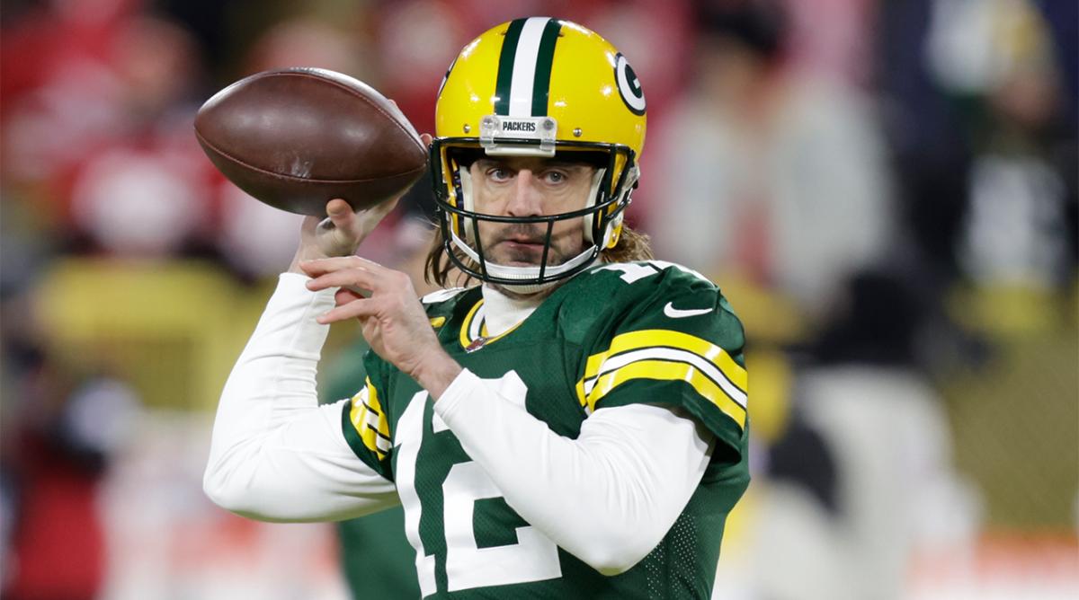 Green Bay Packers' Aaron Rodgers warms up before an NFC divisional playoff NFL football game against the San Francisco 49ers Saturday, Jan. 22, 2022, in Green Bay, Wis.