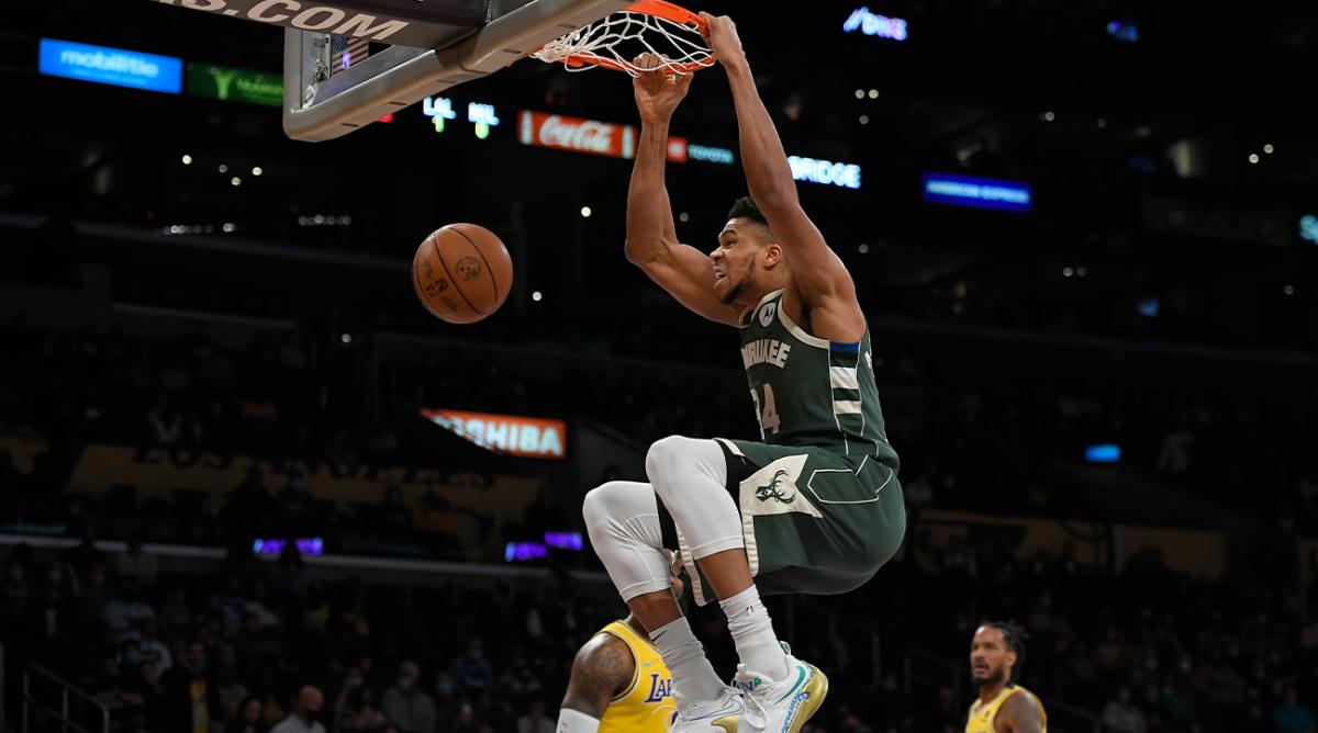 Milwaukee Bucks forward Giannis Antetokounmpo dunks in the first half of an NBA basketball game against the Los Angeles Lakers, Tuesday, Feb. 8, 2022, in Los Angeles.