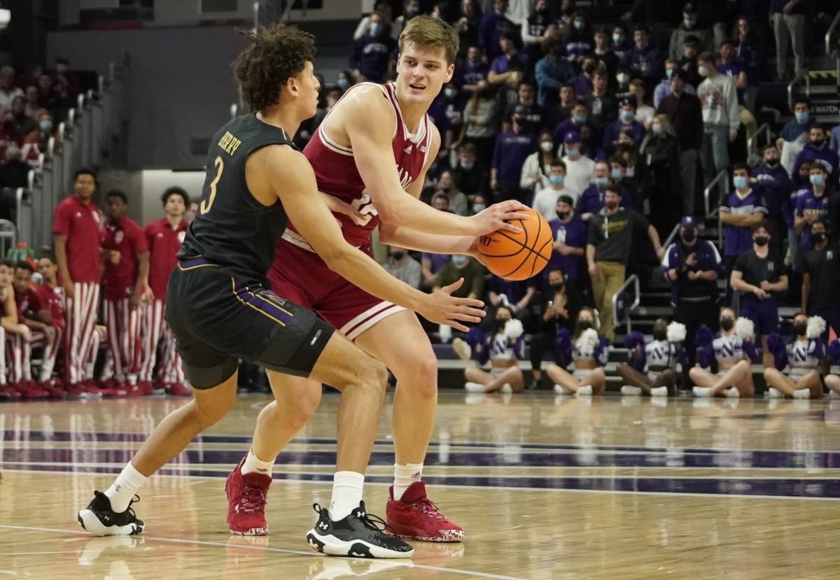Northwestern guard Ty Berry (3) defends Indiana forward Miller Kopp (12), his former teammate, during Tuesday night's game in Evanston, Ind. (David Banks-USA TODAY Sports)