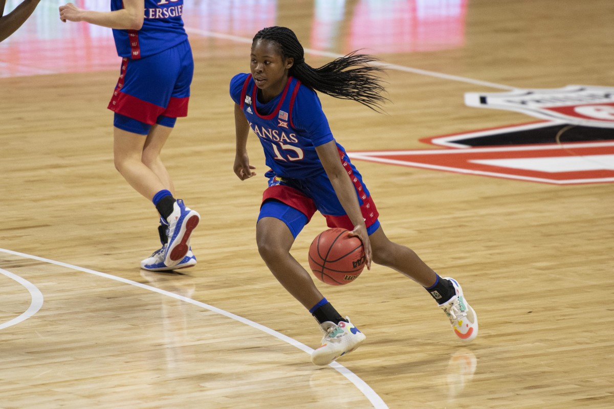 Mar 11, 2021; MO, Kansas City, USA; Kansas Jayhawks guard Zakiyah Franklin (15) drives with the ball against the TCU Horned Frogs in the second half at Municipal Auditorium. Mandatory Credit: Amy Kontras-USA TODAY Sports