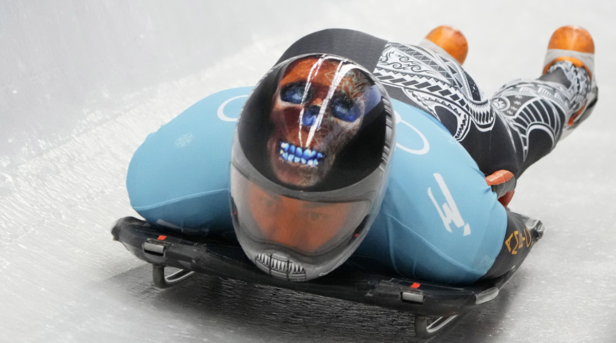 Nathan Crumpton, of American Samoa, slides during a men's skeleton training session at the 2022 Winter Olympics, Tuesday, Feb. 8, 2022, in the Yanqing district of Beijing.