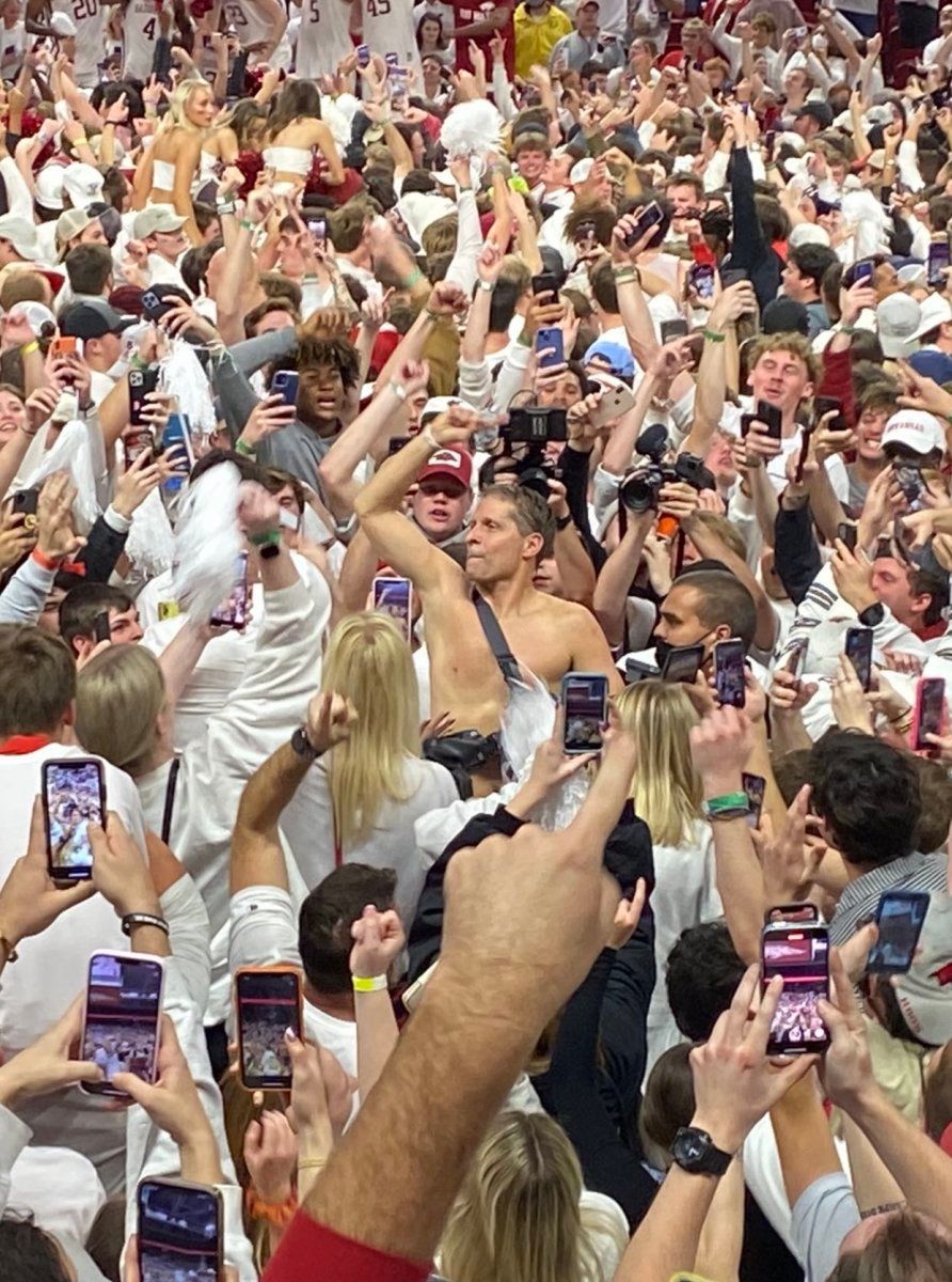 Arkansas coach Eric Musselman went shirtless in the postgame celebration after knocking off No. 1 Auburn at Bud Walton Arena.