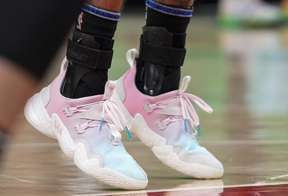 Jan 21, 2022; Atlanta, Georgia, USA; The shoes of Atlanta Hawks guard Trae Young (11) on the free throw line against the Miami Heat during the second half at State Farm Arena.