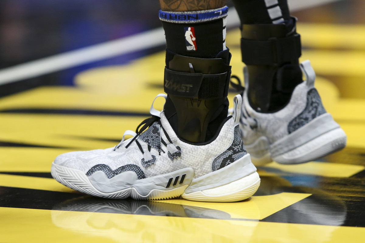 Dec 5, 2021; Atlanta, Georgia, USA; Detailed view of the shoes of Atlanta Hawks guard Trae Young (11) against the Charlotte Hornets in the second half at State Farm Arena.