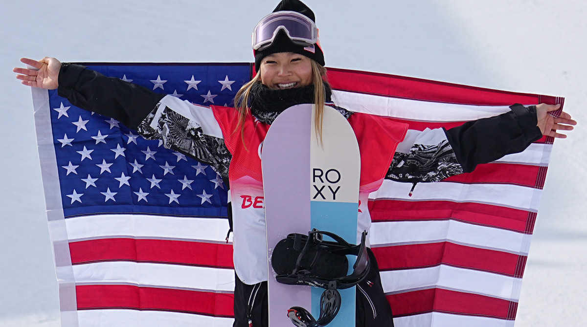 Chloe Kim celebrates winning women's halfpipe at 2022 Beijing Games.