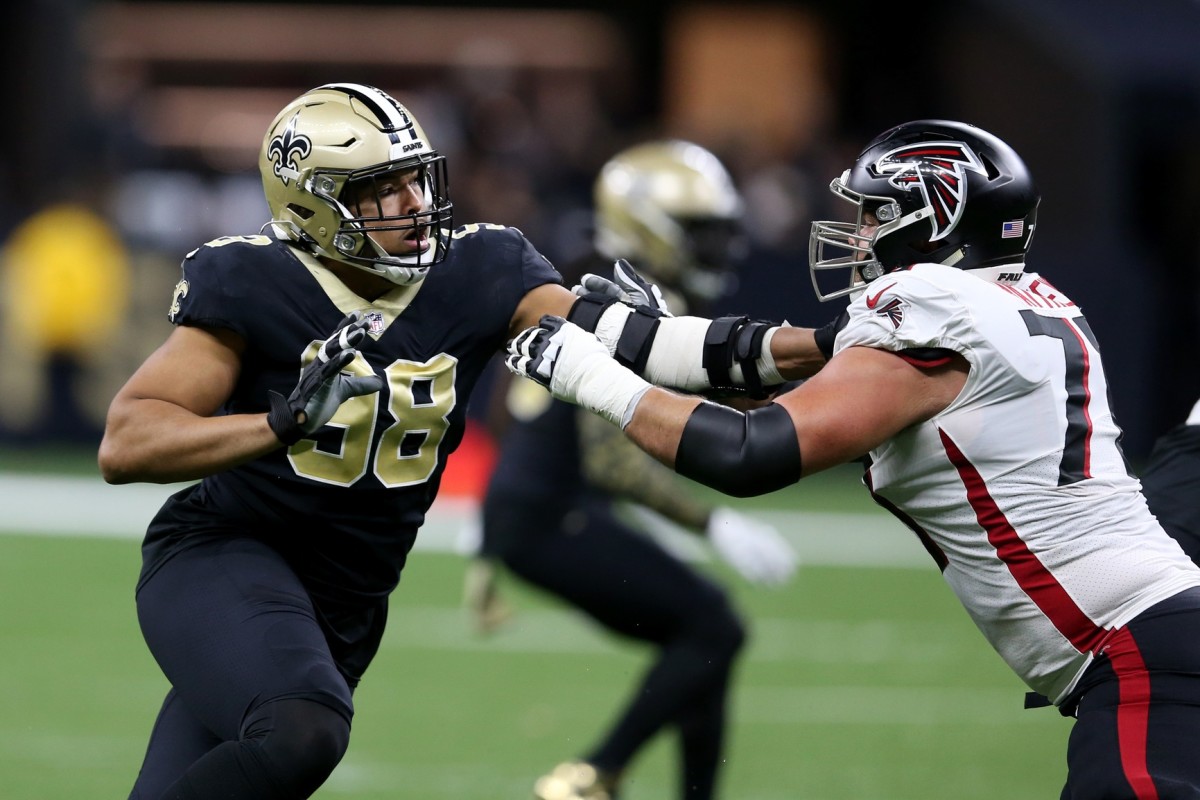 New Orleans Saints defensive end Payton Turner (98) rushes against Atlanta offensive tackle Jake Matthews (70). Mandatory Credit: Chuck Cook-USA TODAY Sports