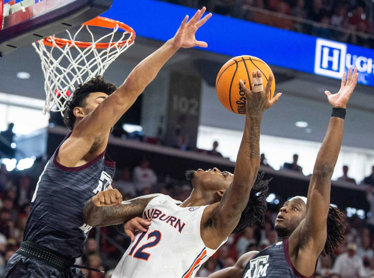 Auburn Tigers guard Zep Jasper (12) goes up for a layup as Auburn Tigers men's basketball takes on Texas A&M Aggies at Auburn Arena in Auburn, Ala., on Saturday, Feb. 12, 2022. Auburn Tigers lead Texas A&M Aggies 33-18 at halftime.
