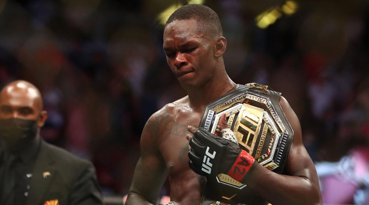 Israel Adesanya reacts following his victory against Marvin Vettori during UFC 263.