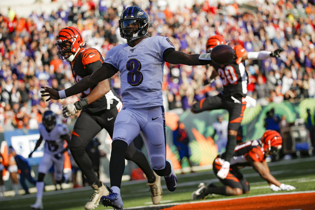 Lamar Jackson scores a touchdown against the Bengals. 