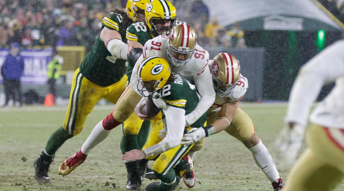 San Francisco 49ers' Arik Armstead sacks Green Bay Packers' Aaron Rodgers during the second half of an NFC divisional playoff NFL football game Saturday, Jan. 22, 2022, in Green Bay, Wis.