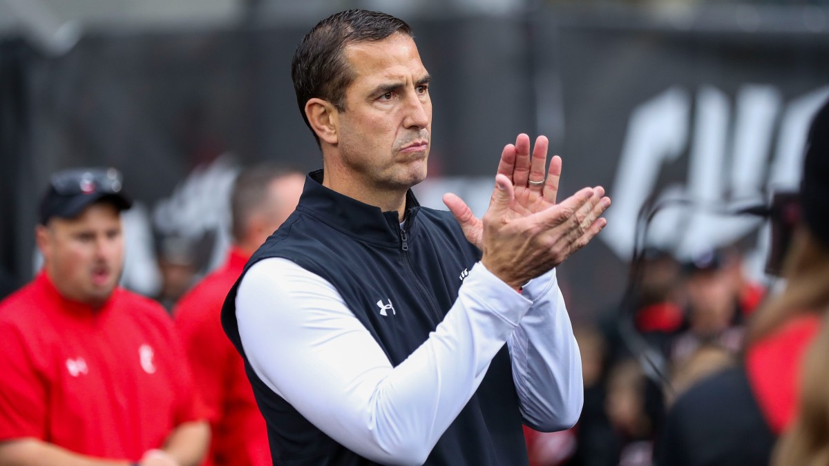 University of Cincinnati coach Luke Fickell was influenced by his quarterback’s decision to stick around the school for longer than some expected.
