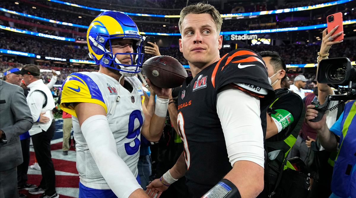 Los Angeles Rams quarterback Matthew Stafford, left, talks with Cincinnati Bengals quarterback Joe Burrow after the NFL Super Bowl 56 football game Sunday, Feb. 13, 2022, in Inglewood, Calif. (AP Photo/Chris O'Meara)