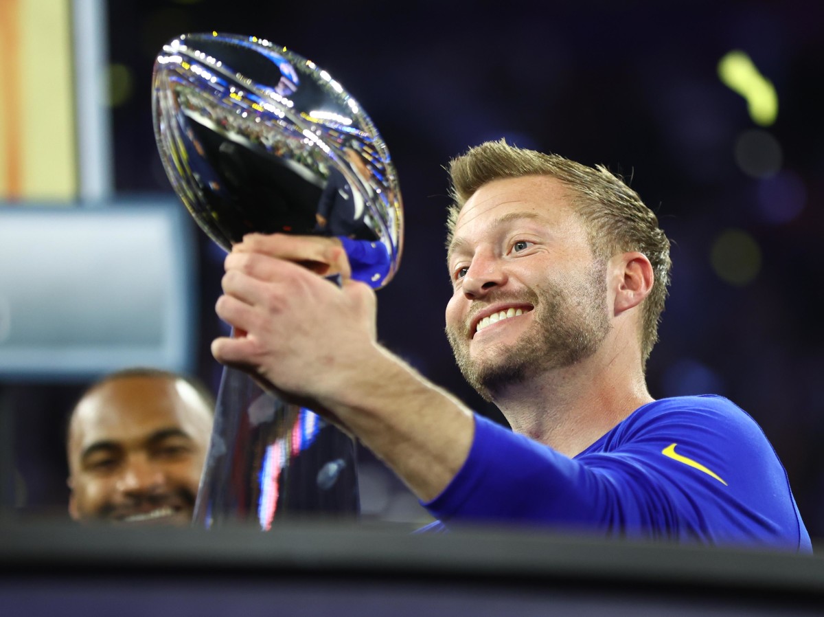 Feb 13, 2022; Inglewood, CA, USA; Los Angeles Rams head coach Sean McVay hoists the Lombardi Trophy after defeating the Cincinnati Bengals in Super Bowl LVI at SoFi Stadium. Mandatory Credit: Mark J. Rebilas-USA TODAY Sports