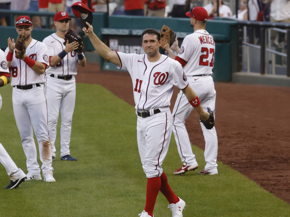 Washington Nationals first baseman Ryan Zimmerman (11) waves to the crowd after being removed from the game against the Boston Red Sox during the eighth inning at Nationals Park.