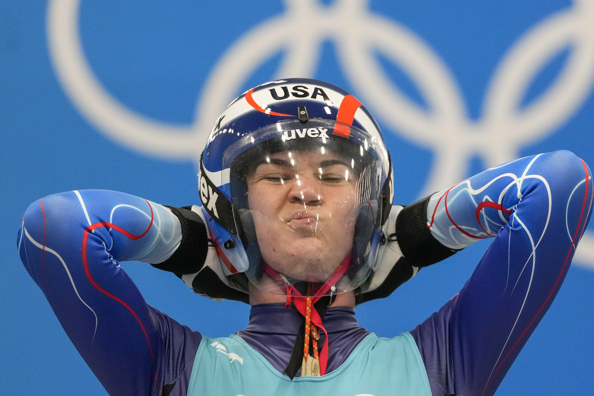 Before a race, Britcher counts down the time until she will feel warm again.