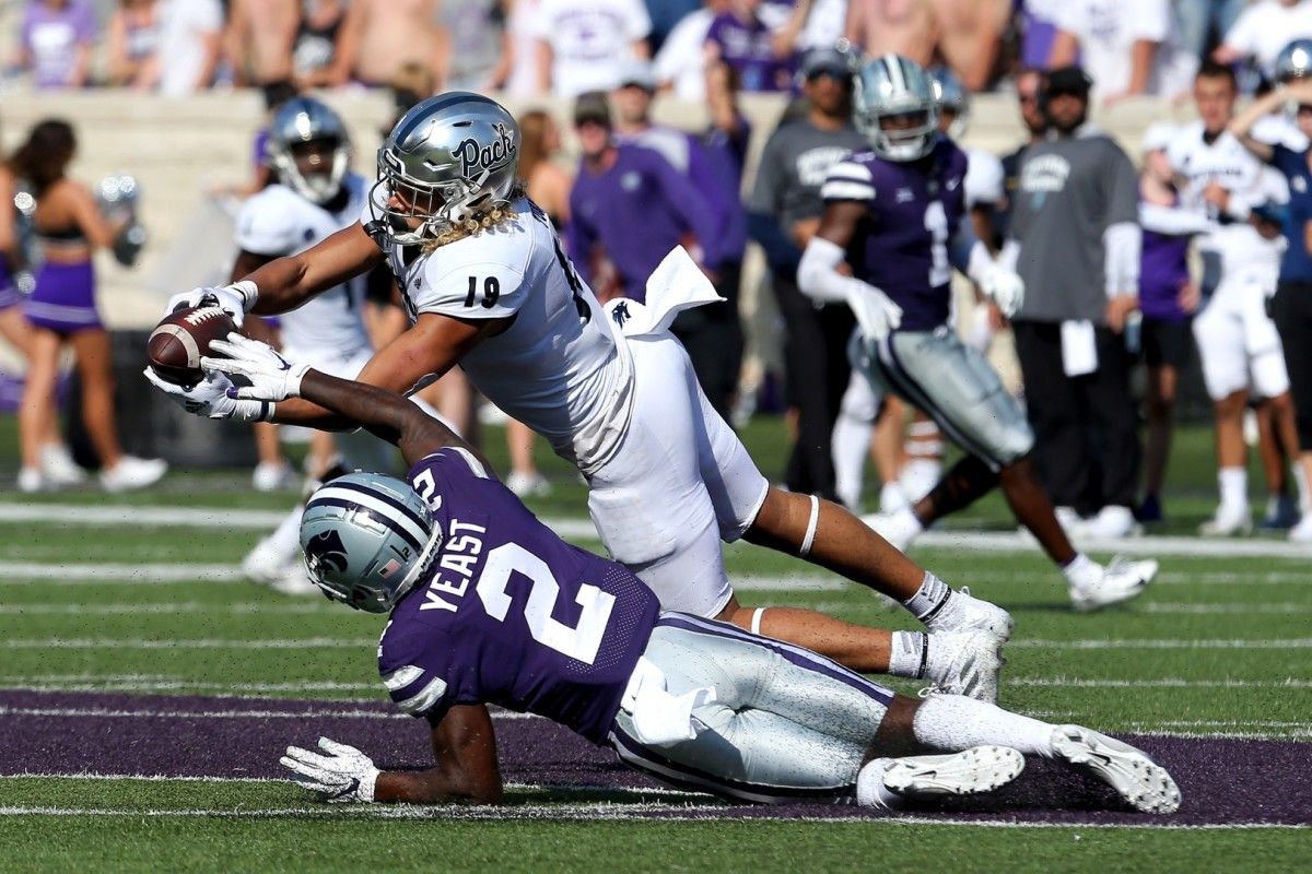Kansas State Wildcats defensive back Russ Yeast (2) breaks up a pass intended for Nevada Wolf Pack tight end Cole Turner (19) during the fourth quarter of a game at Bill Snyder Family Football Stadium.