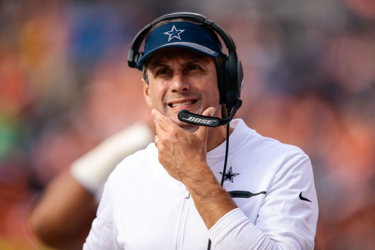 Dallas Cowboys wide receivers coach Derek Dooley in the second quarter against the Denver Broncos at Sports Authority Field at Mile High.
