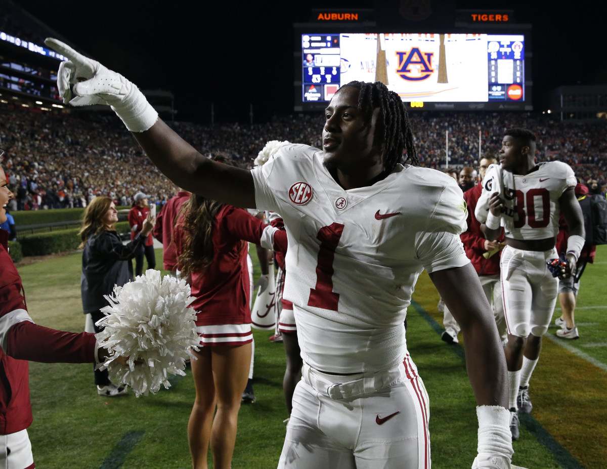 Alabama Crimson Tide defensive back Kool-Aid McKinstry (1) celebrates as he leaves the field after defeating the Auburn Tigers at Jordan-Hare Stadium. Alabama defeated Auburn in four overtimes.