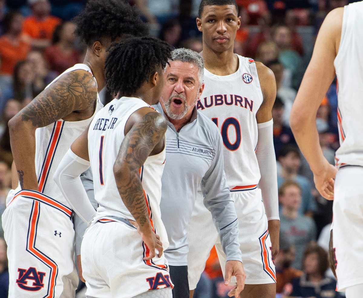 Auburn Tigers head coach Bruce Pearl talks with his team during a break in the action at Auburn Arena in Auburn, Ala., on Wednesday, Feb. 16, 2022. Auburn Tigers lead Vanderbilt Commodores 42-38 at halftime.