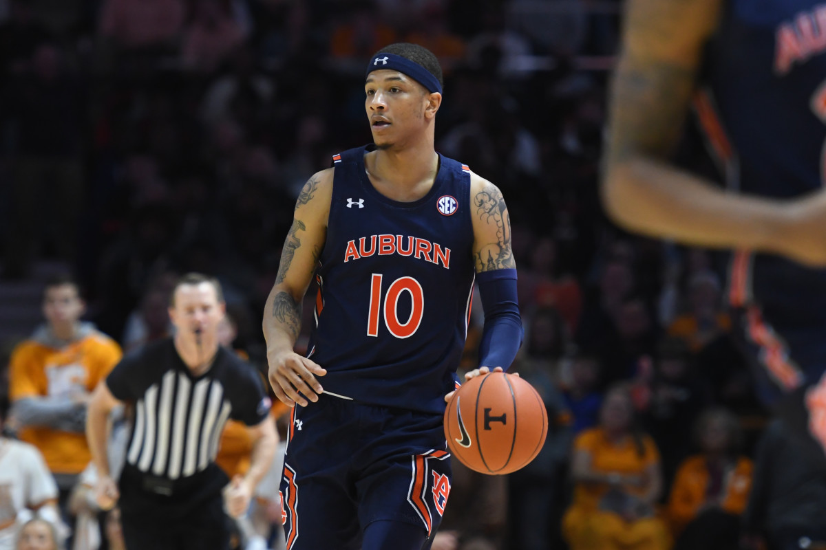 Mar 7, 2020; Knoxville, Tennessee, USA; Auburn Tigers guard Samir Doughty (10) brings the ball up court against the Tennessee Volunteers during the second half at Thompson-Boling Arena. Mandatory Credit: Randy Sartin-USA TODAY Sports