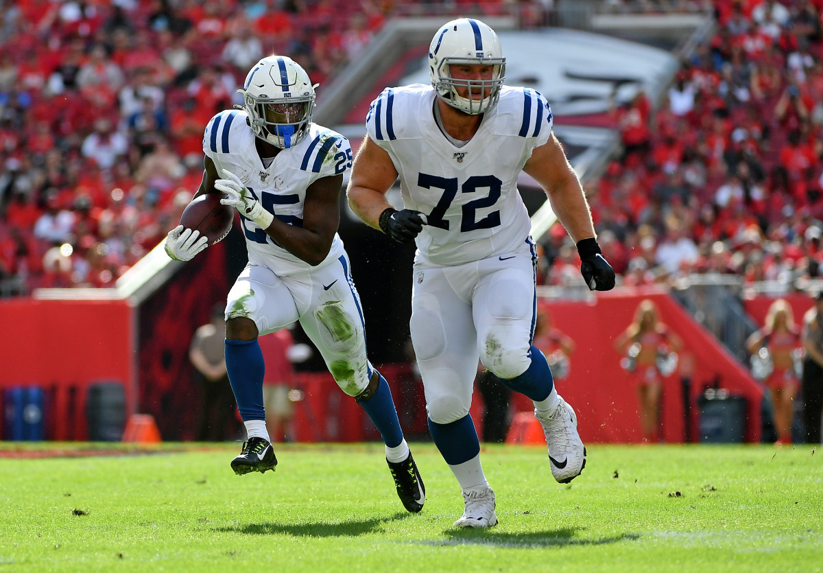 Dec 8, 2019; Tampa, FL, USA; Indianapolis Colts offensive tackle Braden Smith (72) blocks for Indianapolis Colts running back Marlon Mack (25) during the first half against the Tampa Bay Buccaneers at Raymond James Stadium. Mandatory Credit: Jasen Vinlove-USA TODAY Sports