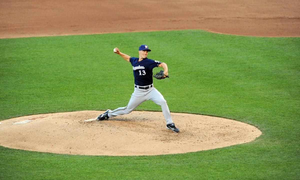 June 12, 2012; Kansas City, MO, USA; Milwaukee Brewers starting pitcher Zack Greinke (13) delivers a pitch in the fifth inning of the game against the Kansas City Royals at Kauffman Stadium. Mandatory Credit: Denny Medley-USA TODAY Sports