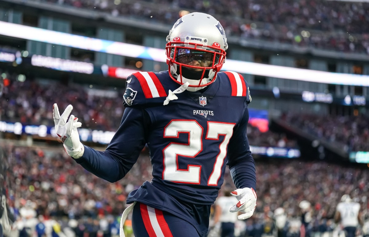 New England Patriots cornerback J.C. Jackson (27) reacts after intercepting a pass in the Tennessee Titans end zone in the second half at Gillette Stadium.